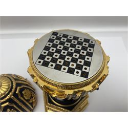 Franklin Mint House of Faberge; The Imperial Jeweled Egg Chess set, the egg opening to reveal a chess board, with a draw to the hexagonal base holding the miniature chess pieces, H23cm 