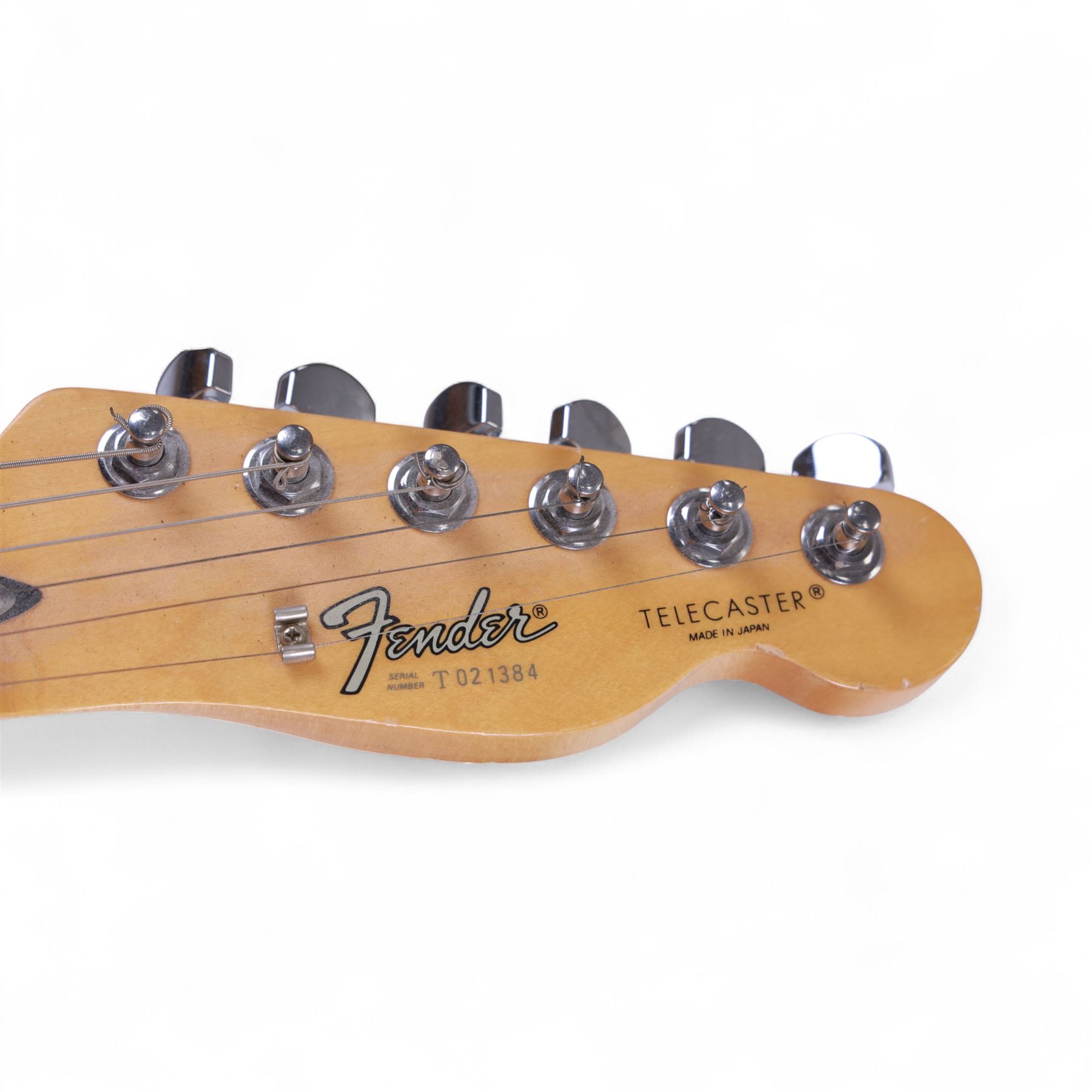 Fender Telecaster electric guitar, serial no. T021384 made in Japan c.1994, with Candy Apple Red body, white scratch plate and maple neck, guitar L98cm