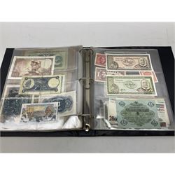 World banknotes, including Queen Elizabeth II The States of Jersey one pound 'DB202703', five pounds 'BB527762' and ten pounds 'AB651481', reserve bank of New Zealand two dollars '1L3 741894', King George V Straits Settlements one dollar 1st January 1935 'F/83 28924', various Bank of England notes etc, housed in two ring binder albums