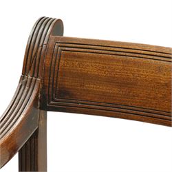 Georgian mahogany reeded carver armchair or elbow chair, bar back and scrolled arm terminals above over-stuffed seat, raised on sabre supports