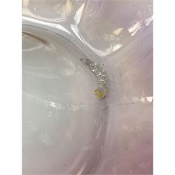 A Victorian cranberry and Vaseline glass epergne, the frilled bowl supporting two frilled trumpets and two canes, H41cm. 