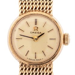 Omega ladies 9ct gold manual wind wristwatch, Cal. 244, white / cream dial with dagger and Arabic hour markers, case by Dennison, Birmingham 1958