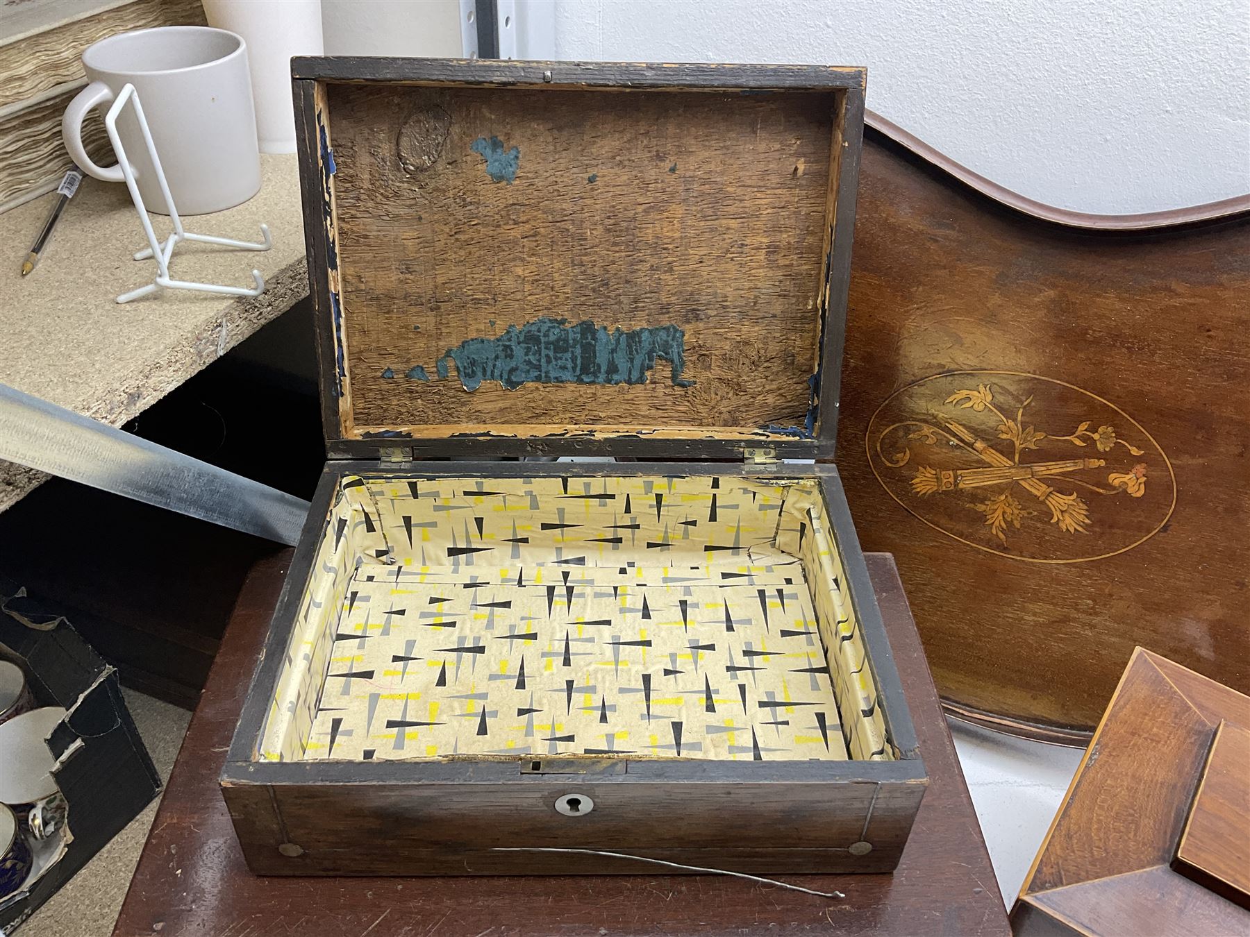 Three 19th century wooden boxes, to include a sewing box of sarcophagus form upon compressed bun feet, plus a mahogany twin handled kidney shaped tray, in one box