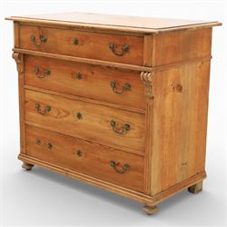 Late Victorian pine chest of drawers, the moulded top above four long drawers with brass drop handles and flower head escutcheons, flanked by pilasters, upon four turned compressed bun feet, 89cm x 103cm x 54cm