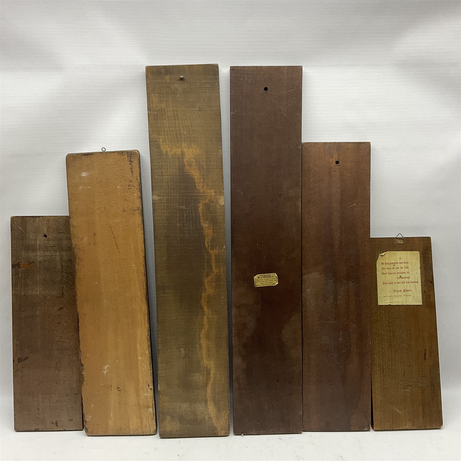 Six 20th century hardwood Dutch folk art Speculaasplank or biscuit moulds, typically carved with figures in traditional dress, largest H101cm
