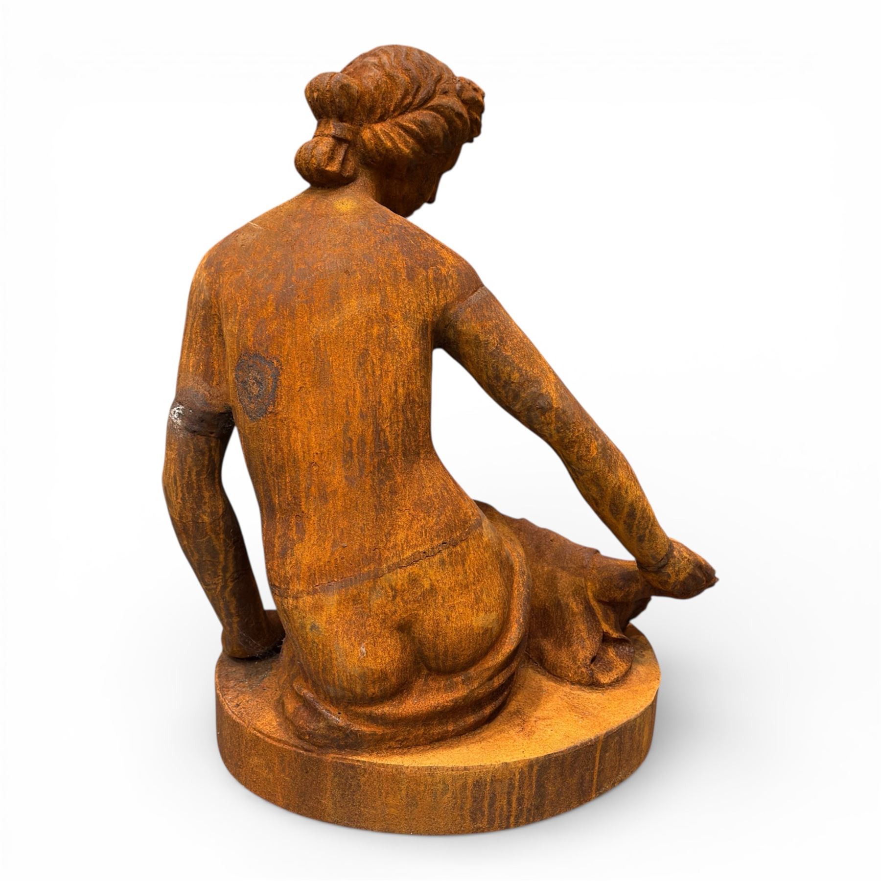 Victorian design cast iron semi-nude seated lady, on oval plinth base