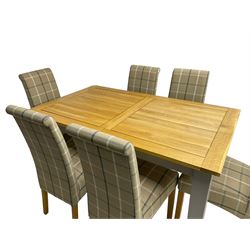Oak Furnitureland - rectangular extending dining table on grey painted base (W150cm D90cm H78cm); together with a set of six high back dining chairs, upholstered in checkered fabric, raised on oak supports (W49cm H99cm)
