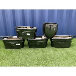 Quantity of black glazed garden planters in various sizes and shapes, 16 in total  - THIS LOT IS TO BE COLLECTED BY APPOINTMENT FROM DUGGLEBY STORAGE, GREAT HILL, EASTFIELD, SCARBOROUGH, YO11 3TX