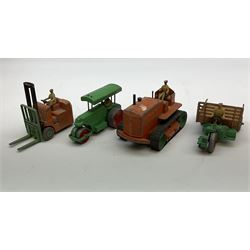 Dinky - six unboxed and playworn die-cast commercial vehicles comprising Blaw Knox Bulldozer, Heavy Tractor with driver, Coles Mobile Crane, Fork Lift Truck with driver, Motocart with driver and Aveling Barford Steam Roller (6)
