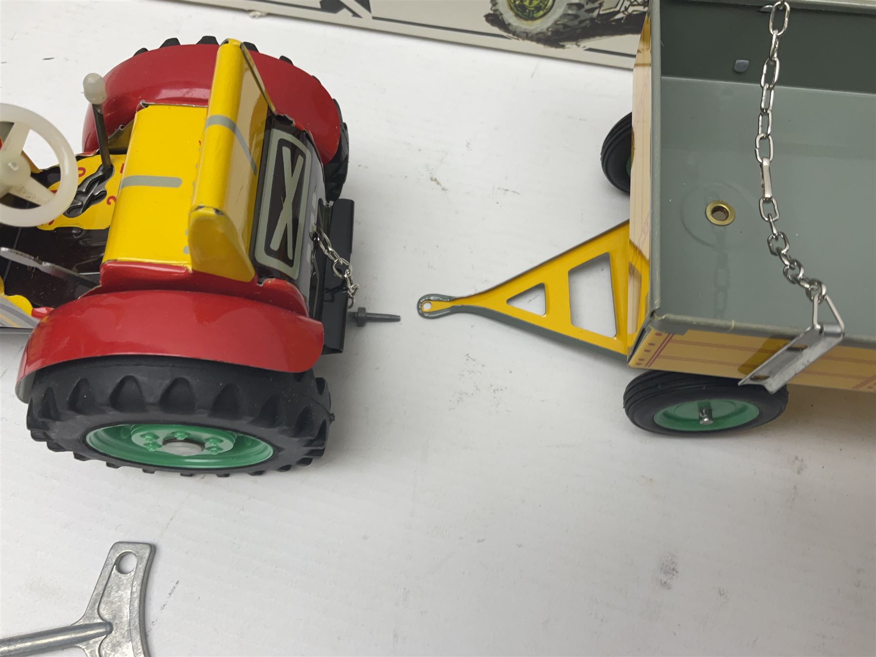 Kovap - eleven tinplate models to include Tractor and Trailer, Road Roller 1927, Moving Moneybox 1924, Hawkeye type B 1924, Boy on a Tricycle; all in original boxes 