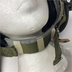 Silver grey SPH-4B Flight Helmet as used by helicopter pilots in the USAF and US Army in the 1990s; made of epoxy resin reinforced fibreglass; fitted with clear and tinted visors and complete with an M-87A/AIC boom mike; original condition and bench tested.