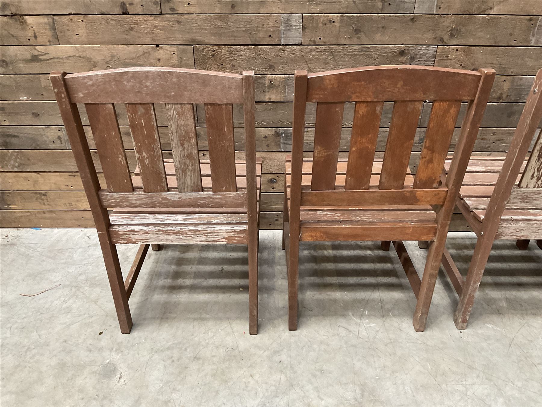Set of 4 wooden garden chairs