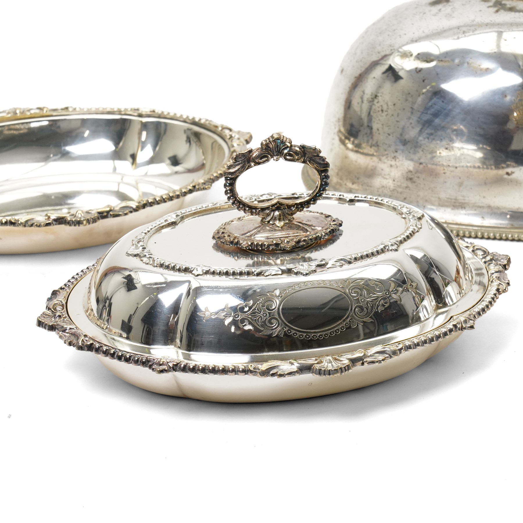 Pair of silver plated oval entree dishes and covers with bead edge and shell moulded borders and engraved covers and matching chafing dish by Martin Hall & Co and a plated meat cover