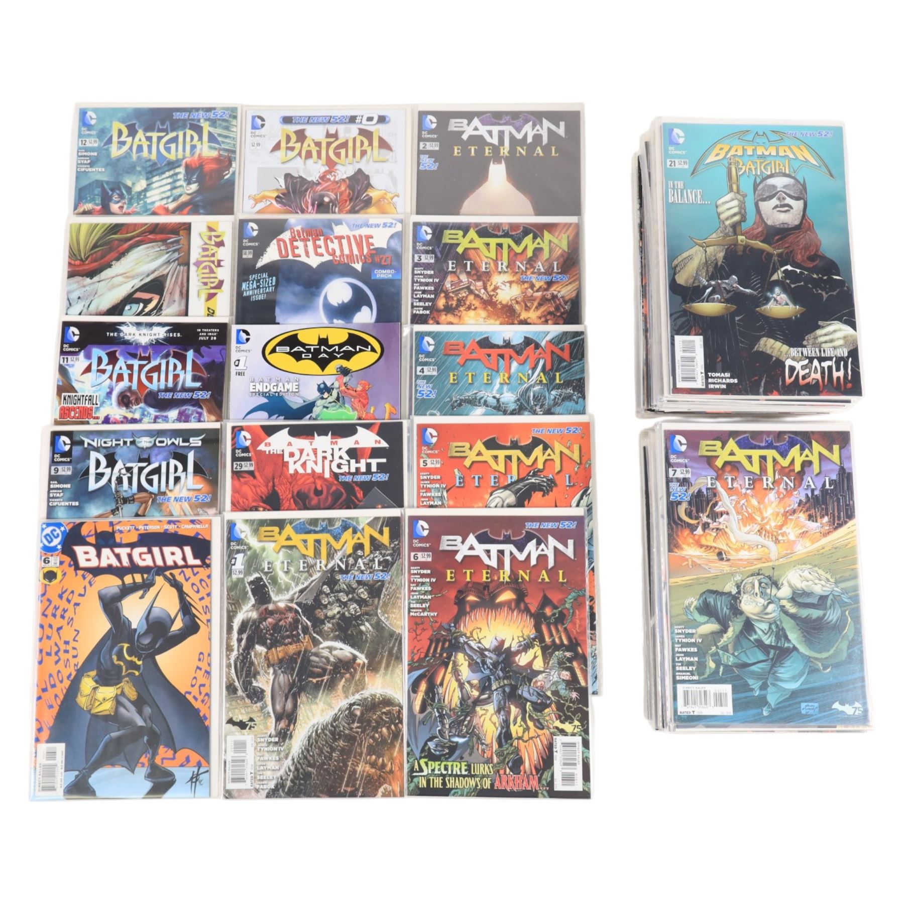 Seventy-eight modern DC comic books circa 2012-2014, including Batman, Batman Eternal, Batman The Dark Knight, Batman Detective, Teen Titans and Batgirl, together with a 1988 DC Batgirl #1 