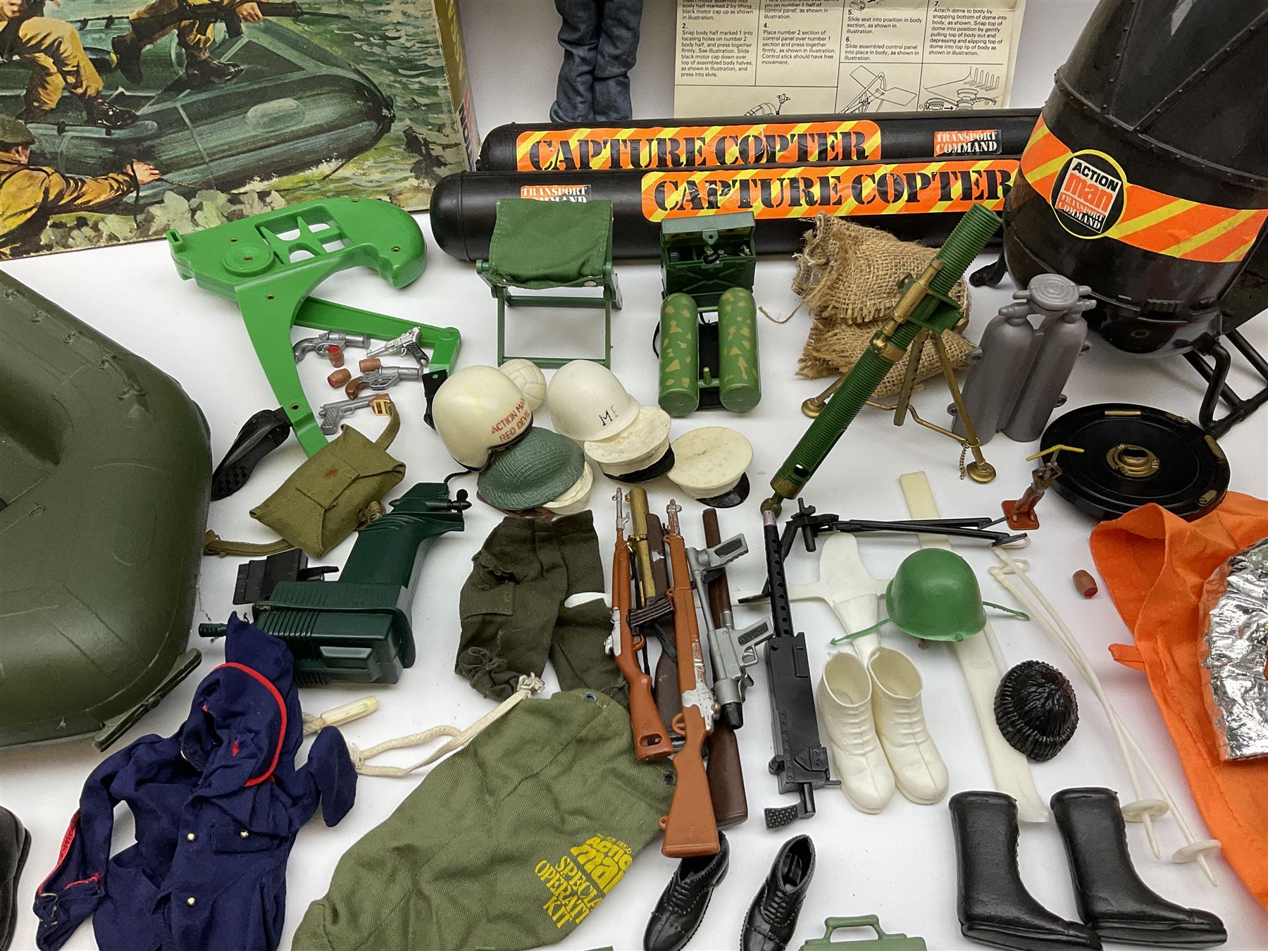Action Man - one figure, boxed Assault Craft, dismantelled  Capture Copter, two bags of equipment and accessories etc