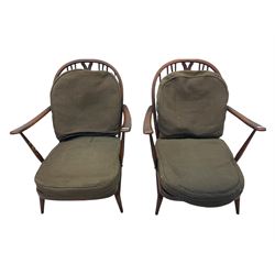 Ercol - pair of dark elm easy armchairs