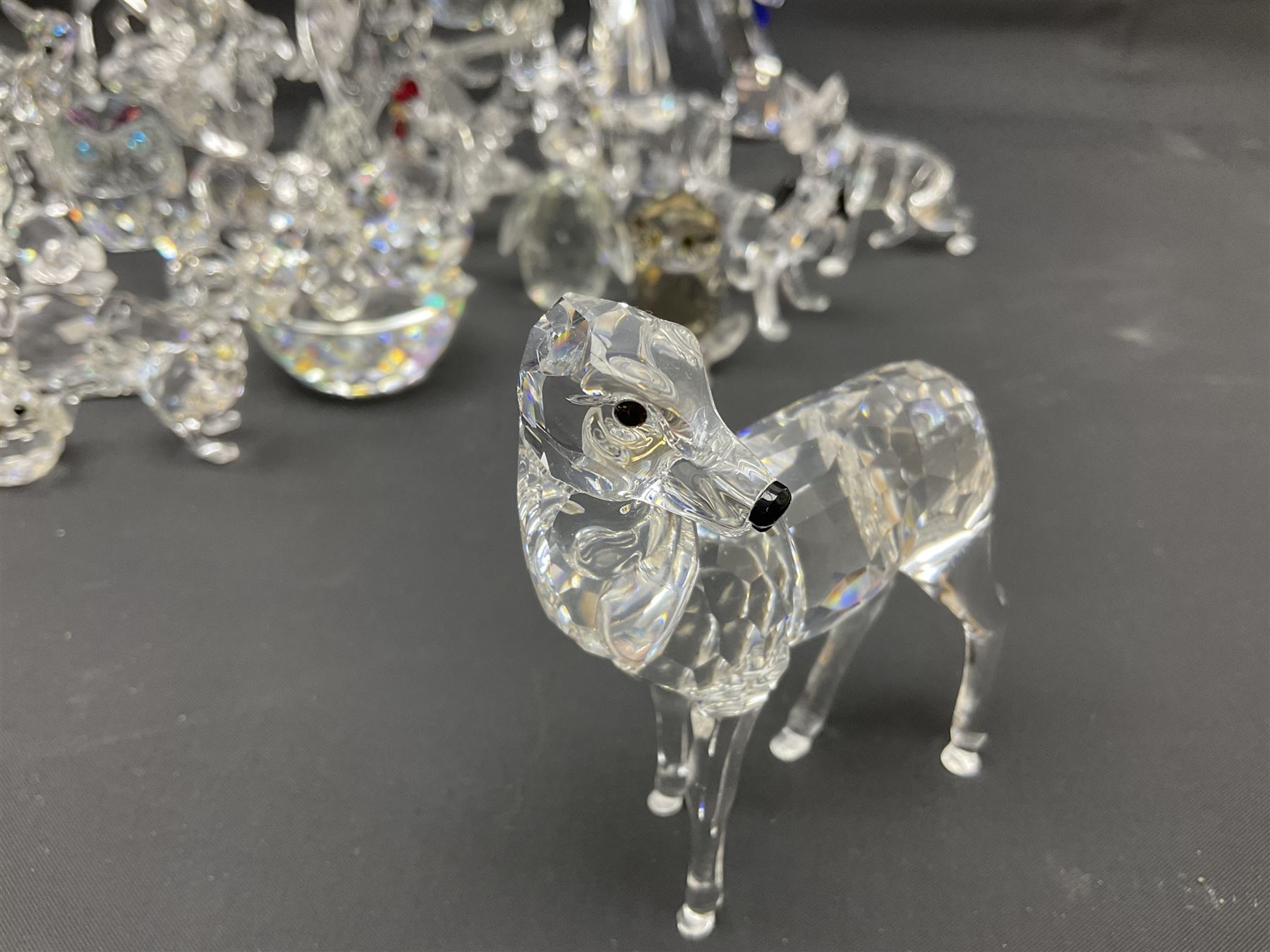 Swarovski Crystal animals, to include sheep, pigs, antelope, cockeral and hen, chicks, Pegasus, owls, giraffe, etc, together with Swarovski Crystal dancer, Isadora