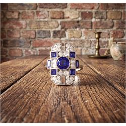 Platinum sapphire and diamond panel ring, milgrain set with round and calibre cut sapphire...