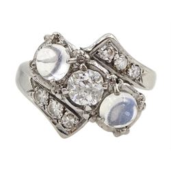 14ct white gold old cut diamond and moonstone crossover ring, central diamond approx 0.55 carat