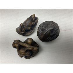 Eight netsuke, modelled as frogs, insects and a tortoise