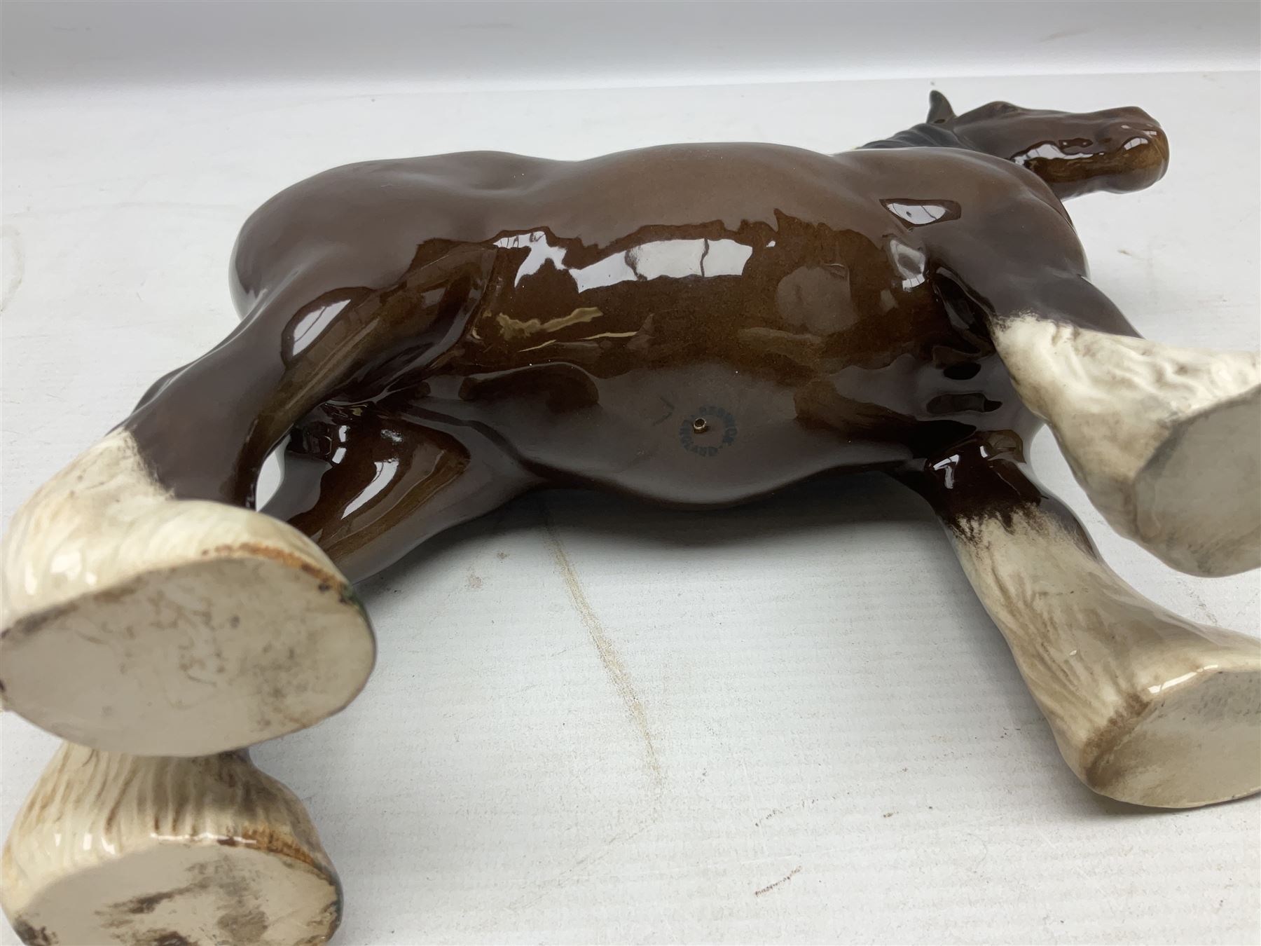 Two Border Fine Arts figures, comprising Badgers and Blackbird, together with Beswick bay shire horse no 818 and another figure