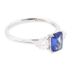 Platinum sapphire and diamond three stone ring, single emerald cut sapphire of approx 0.70 carat, either side set with two round brilliant cut diamonds, hallmarked, total diamond weight approx 0.50 carat