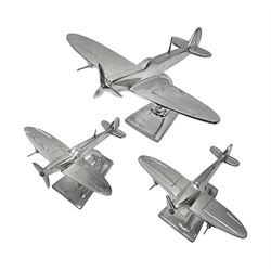 Set of three aluminium planes with rotating propellers, tallest H18cm