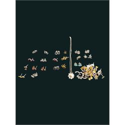 Group of silver earrings, including rain