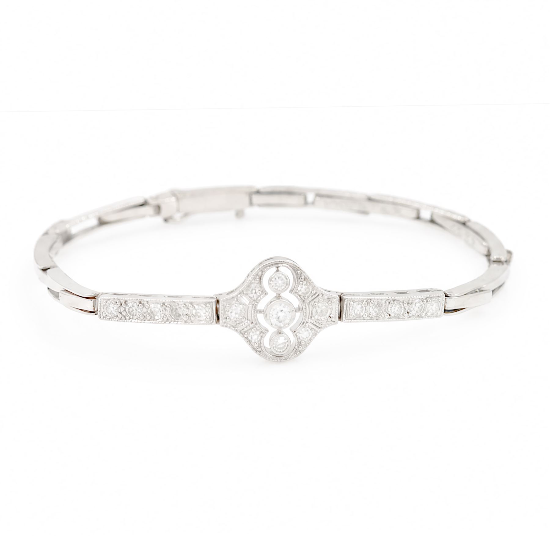 Art Deco white gold and platinum diamond bracelet, the central articulated panel milgrain set with old and single cut diamonds, to a white gold expanding link bracelet, stamped 18ct