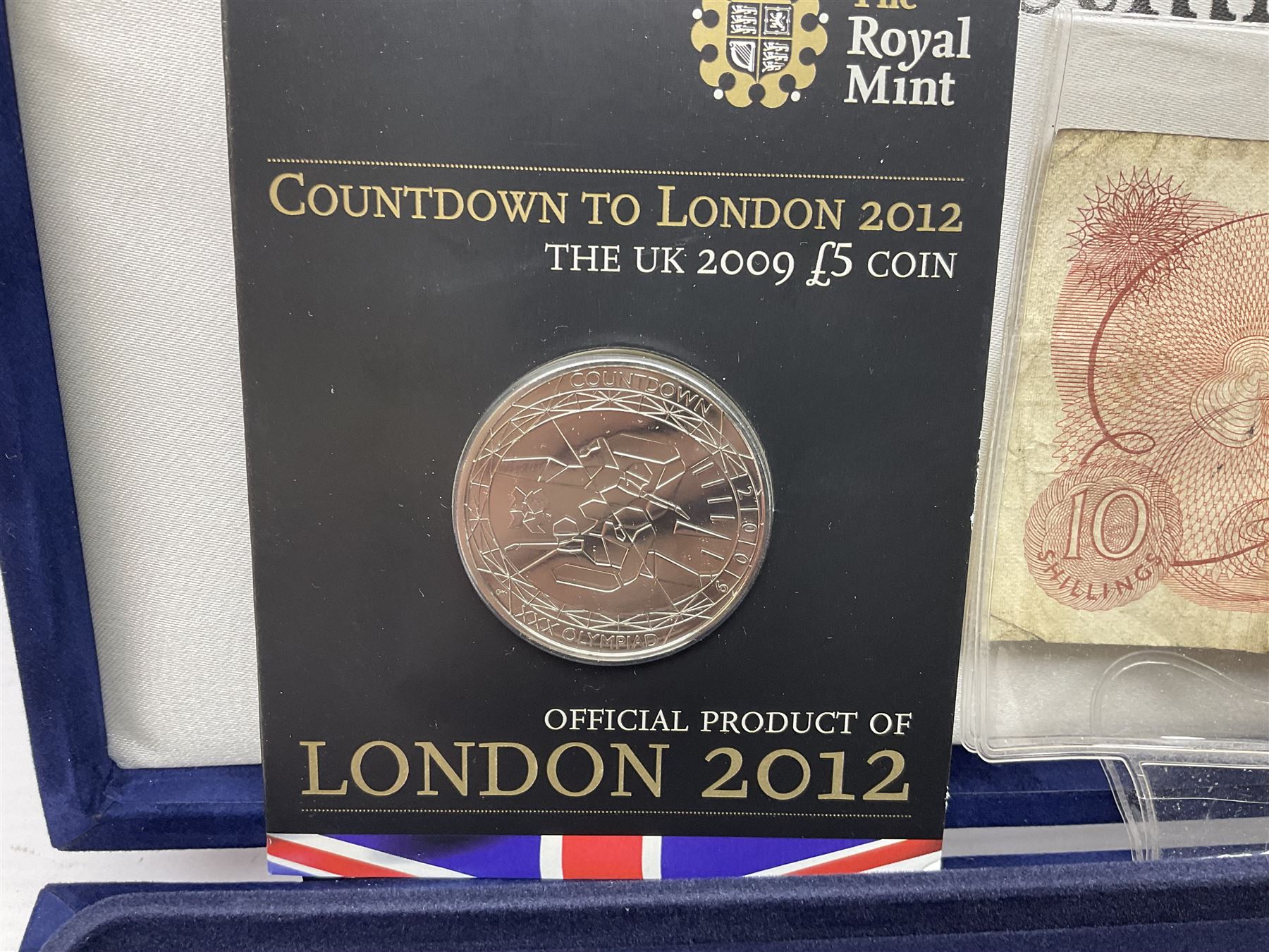 Mostly commemorative coins, including crowns, Queen Elizabeth II 2009 countdown to London 2012 five pound coin on card, 'The 2012 Diamond Jubilee' coin set in card folder, Cook Islands 2013 one dollar commemorating 'Coronation sixty years 1953 2013' etc