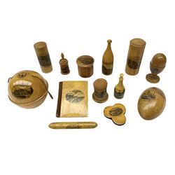 Collection of Mauchline ware relating to sewing, to include two tape measures, one example featuring 'the wish tower, Eastbourne, two pin cushions, the taller example featuring Ventnor looking west, four thimble holders etc (12)
