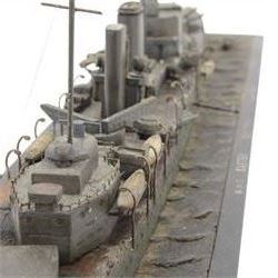  HMS Exeter, Waterline wartime metal model upon a wooden base, circa 1939-45, H24cm, L82cm  