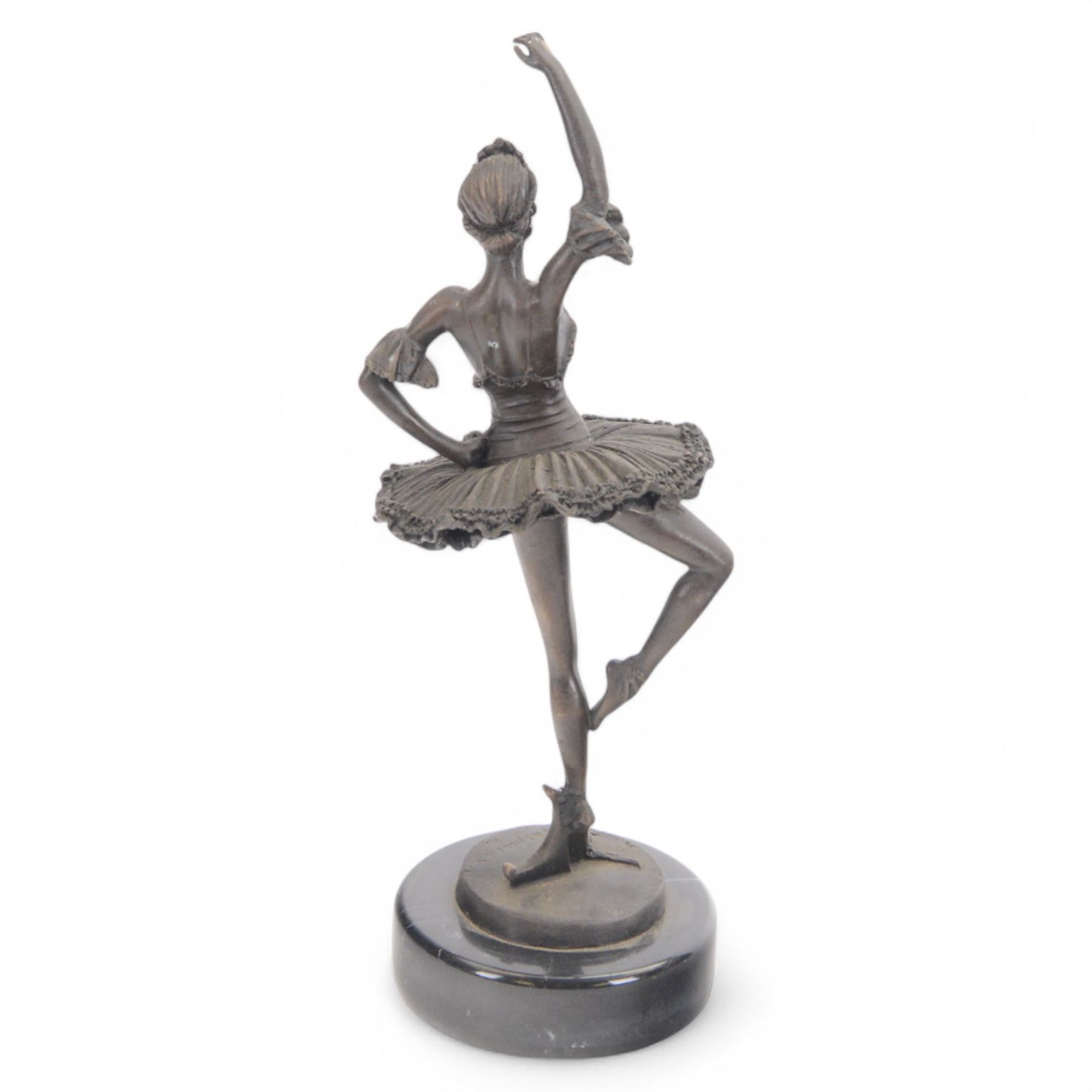 Bronzed figure of a ballerina, signed Chiparis to base, upon circular marble plinth, H32cm