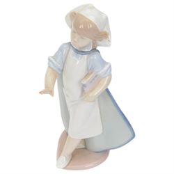 Four Lladro figures, comprising Loving Care no 6087, Young Nurse no 6307, Girl with Chicken no 4592 and Female Physician no 5197, three with original boxes 