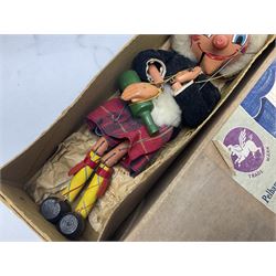 Pelham Puppet of a Scotsman in early brown box marked 'Skeleton'; Chad Valley 'Escalado' racing game with die-cast horses, boxed with original packaging; modern 'Mah Jongh' set in vinyl case with instructions; and Kuemmerling dice game, boxed (4)