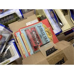 Collection of Tetley Tea collectibles to include sixteen 1:43 scale model cars from Lledo and Oxford Die-Cast with further Tetley Tea figures and tinned coaster set