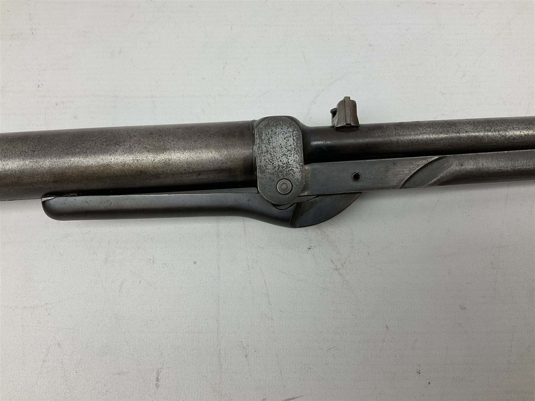 BSA .177 air rifle with top loading under lever action, walnut stock carved with chequered BSA logo to grip, serial no.A1203 L102cm