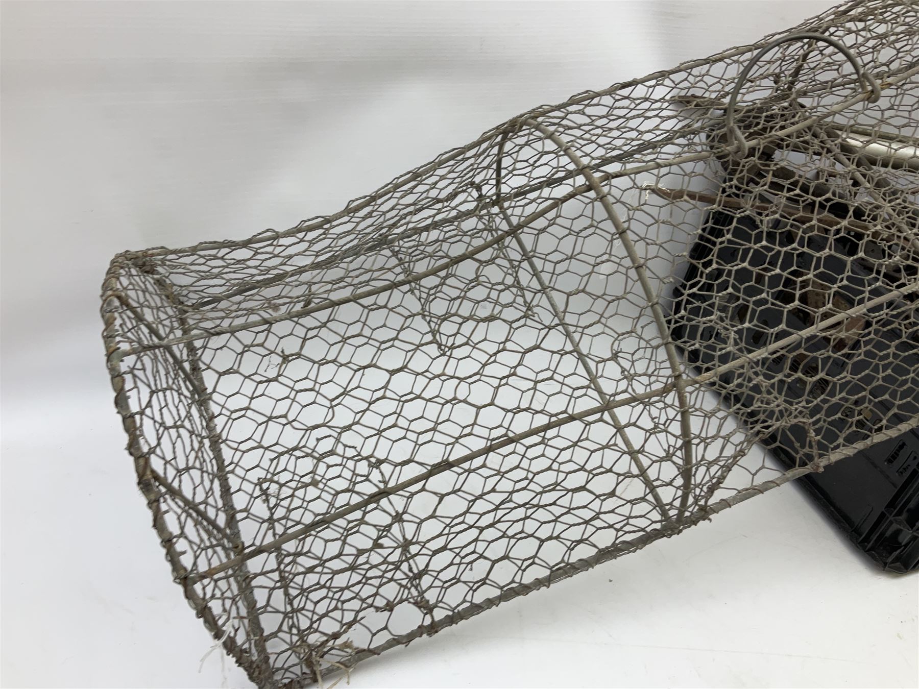 Quantity of animal traps including, gin traps, eel spears, Young's sparrow trap etc, Auctioneer's Note: These traps are sold as artefacts for ornamental purposes only as the use of some of them may be illegal