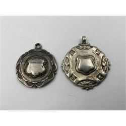 Ten early 20th century silver cartouche fobs, to include a Yorkshire Rose example, all hallmarked with various dates and makers
