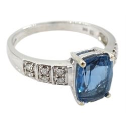 9ct white gold London blue topaz ring, with diamond set shoulders, hallmarked 