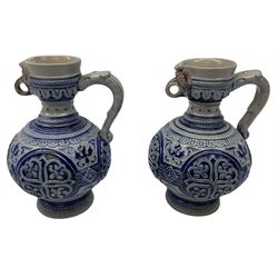 Pair of late 19th Century German Simon Peter Gerz salt glaze stone jugs, impressed mark to base, model number 550, H15cm