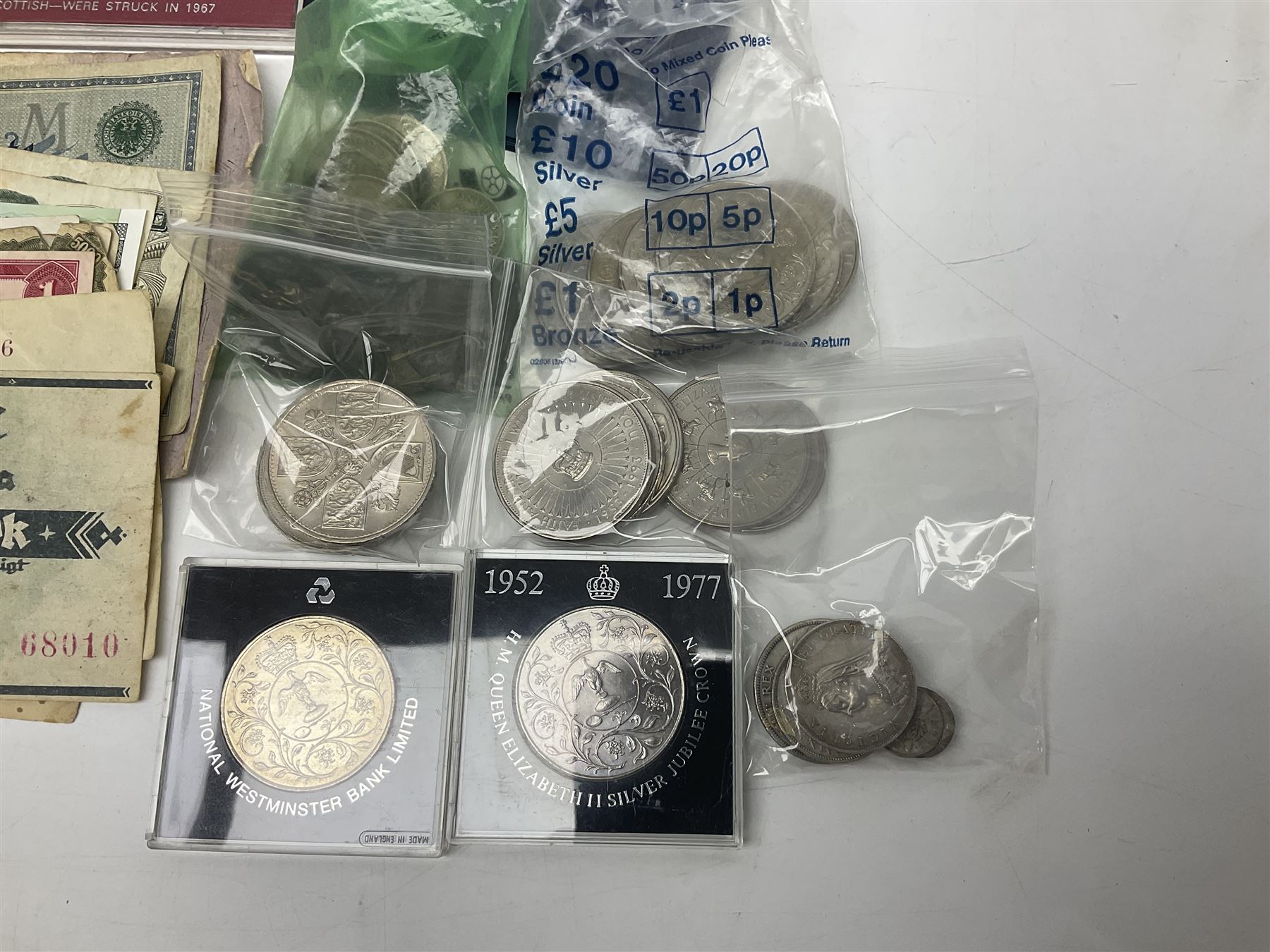 Great British and World coins and banknotes, including two Queen Victoria 1887 florins, King George V 1930 halfcrown, pre decimal pennies and other denominations, five Queen Elizabeth II five pound coins, United States of America 1964 Kennedy half dollar, German and other banknotes etc