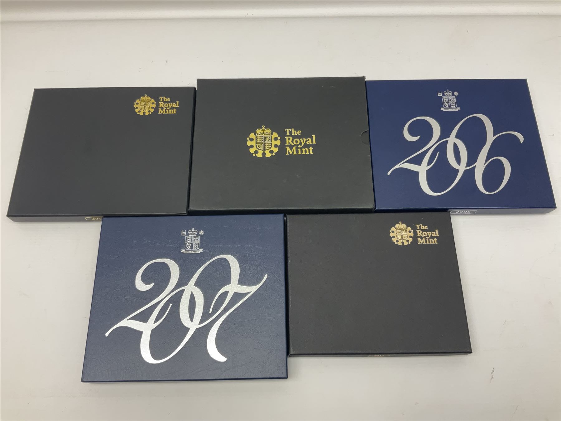 Five The Royal Mint United Kingdom proof coin sets, dated 2006, 2007, 2008, 2010 and 2011, all cased with certificates