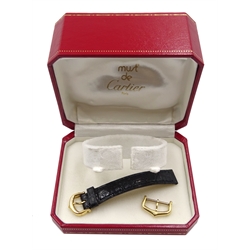 Two Cartier 18ct gold watch strap buckles, stamped 750, with Must de Cartier box 