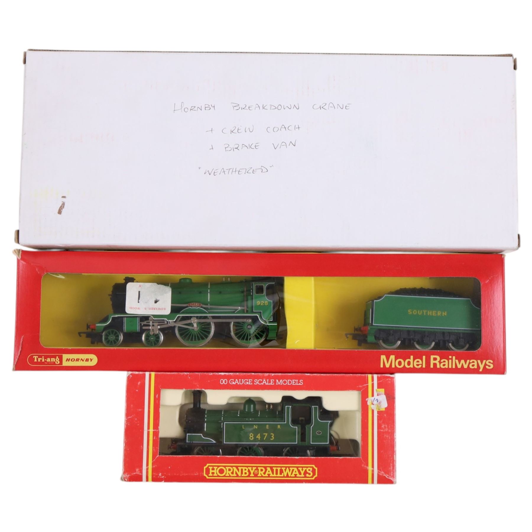 Three boxed 00 gauge Hornby locomotives, two unboxed 00 gauge locomotives, including Bachmann Class A1 Tornado, two Hornby composite coaches, Hornby breakdown crane and an empty Bachmann presentation box