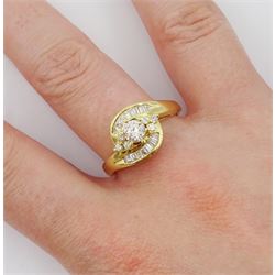 18ct gold diamond crossover ring, the central round brilliant cut diamond of approx 0.45 carat, with round brilliant and tapered baguette cut diamond surround, total diamond weight approx 1.00 carat