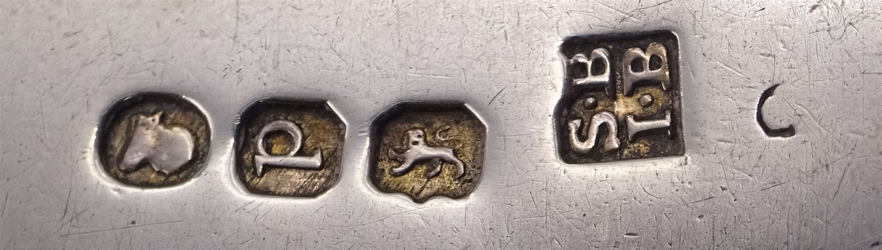 George III silver Old English pattern soup ladle, with oblique gadrooned border, hallmarked London 1790, maker's mark VS, L24.7cm, together with a George III silver Old English pattern sauce ladle, hallmarked Sarah & John William Blake, London 1819, L17cm, and a George IV silver Fiddle pattern sauce ladle, hallmarked London 1825, maker's mark WE, probably William Eaton, L16.8cm