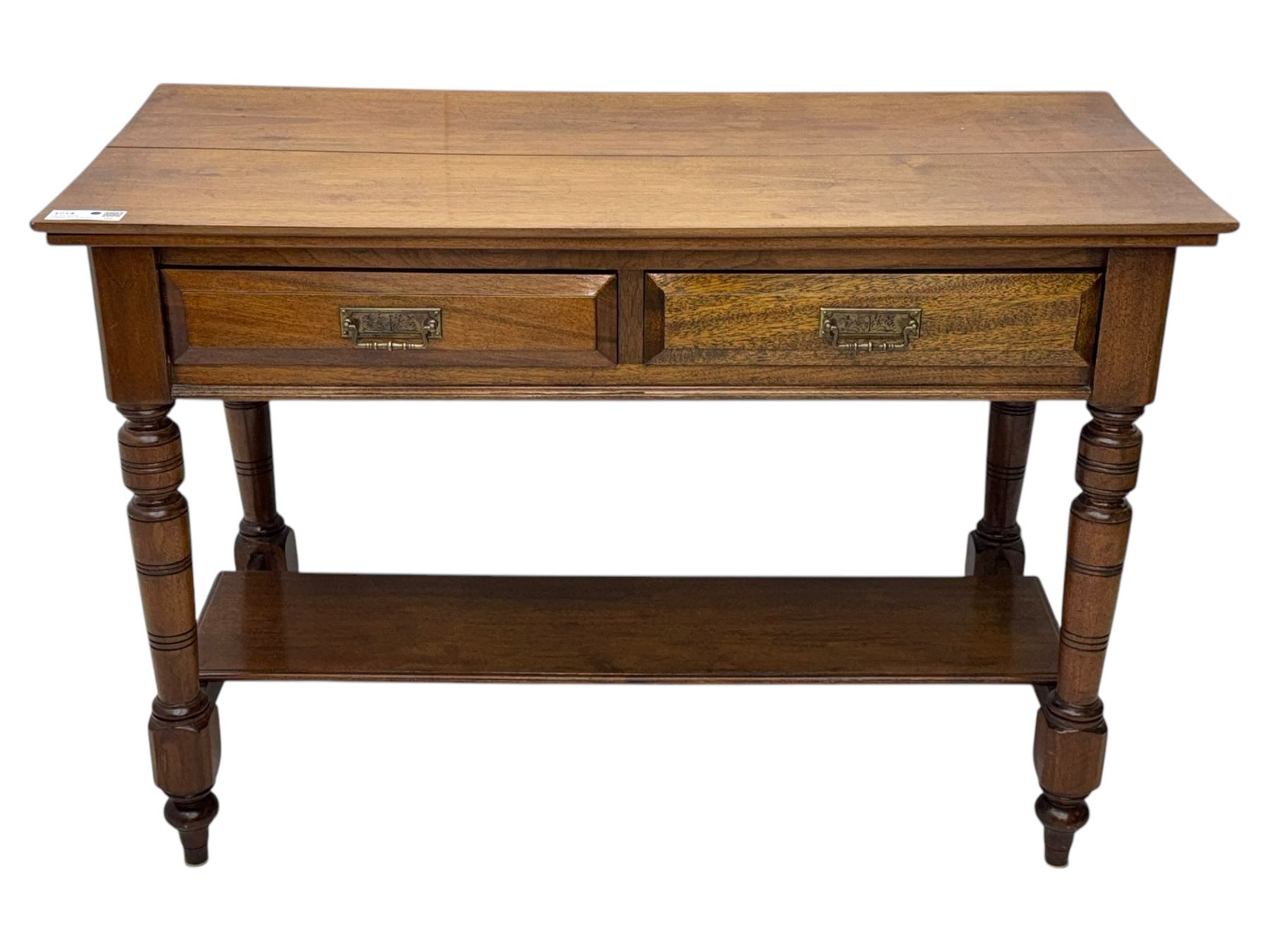Victorian mahogany side table fitted with two drawers,  rectangular top over two short drawers with moulded facias and brass drop handles, turned front and rear supports joined by an open undertier, on turned feet 