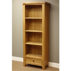  Light oak four tier open bookcase with single drawer, W70cm, H182cm, D37cm  