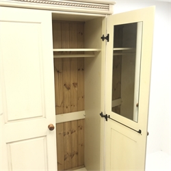 Painted pine double wardrobe, projecting cornice, two doors enclosing single shelf and hanging rail, plinth base, W111cm, H199cm, D60cm